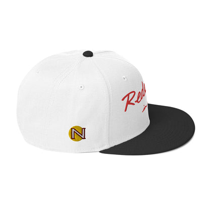 REDEEMED IN CHRIST (red embroidery) — Unisex Snapback Hat